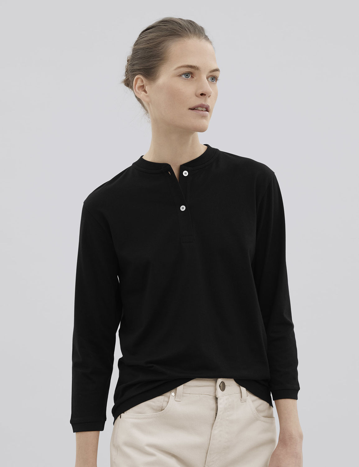women's black long-sleeved henley t-shirt
